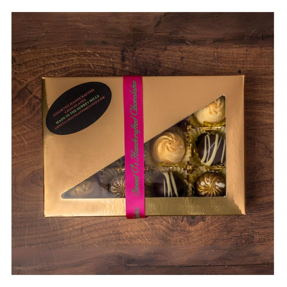 
                  
                    Sweet C's Box of 12 Assorted Chocolates
                  
                