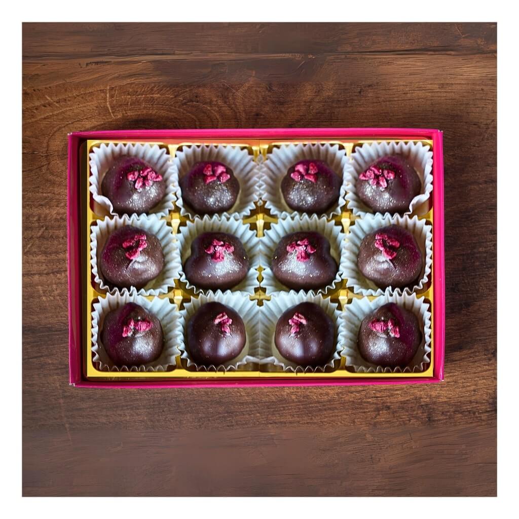 
                  
                    Sweet C's Dark Chocolate Raspberry Truffles in box
                  
                