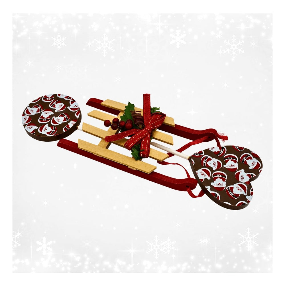 Christmas-themed sleigh with patterned  Chocolate Lollies