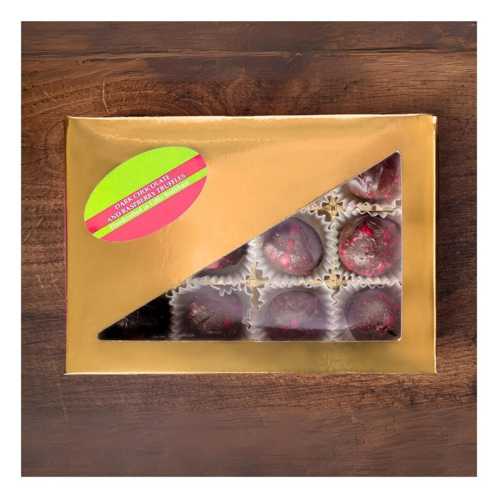 
                  
                    Sweet C's Dark Chocolate Raspberry Truffles in closed box
                  
                