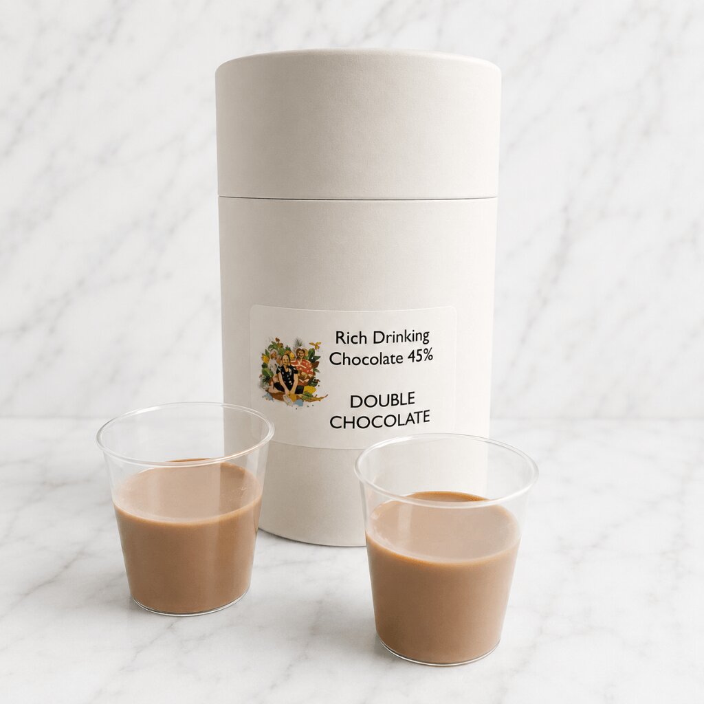 
                  
                    Two cups of rich drinking chocolate next to a cylindrical container labeled 'Double Chocolate' on a white background.
                  
                